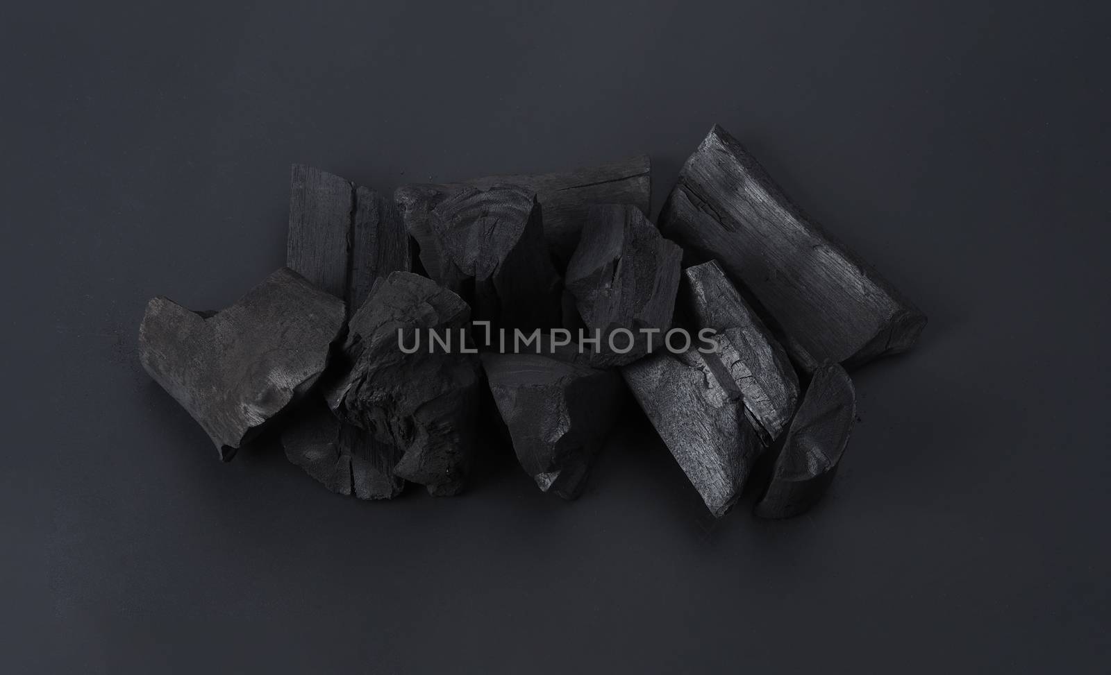 Group of charcoal black color made from real wood in studio clos by gnepphoto