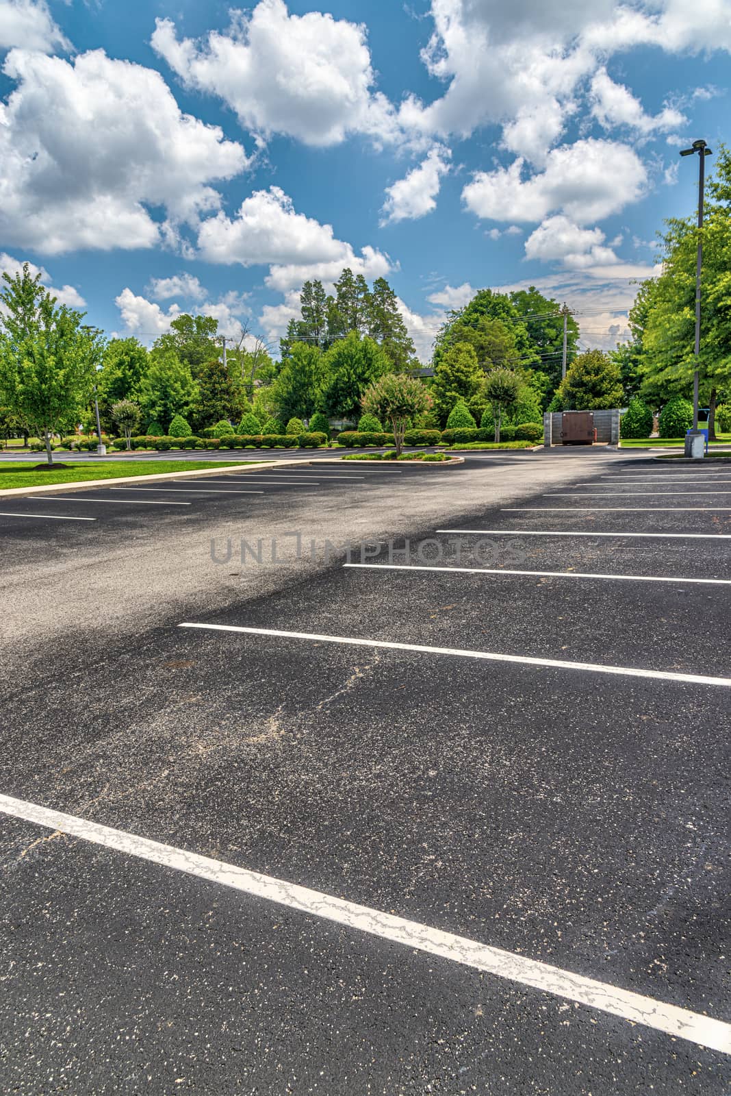 Empty Business Parking Lot During The Pandemic by stockbuster1