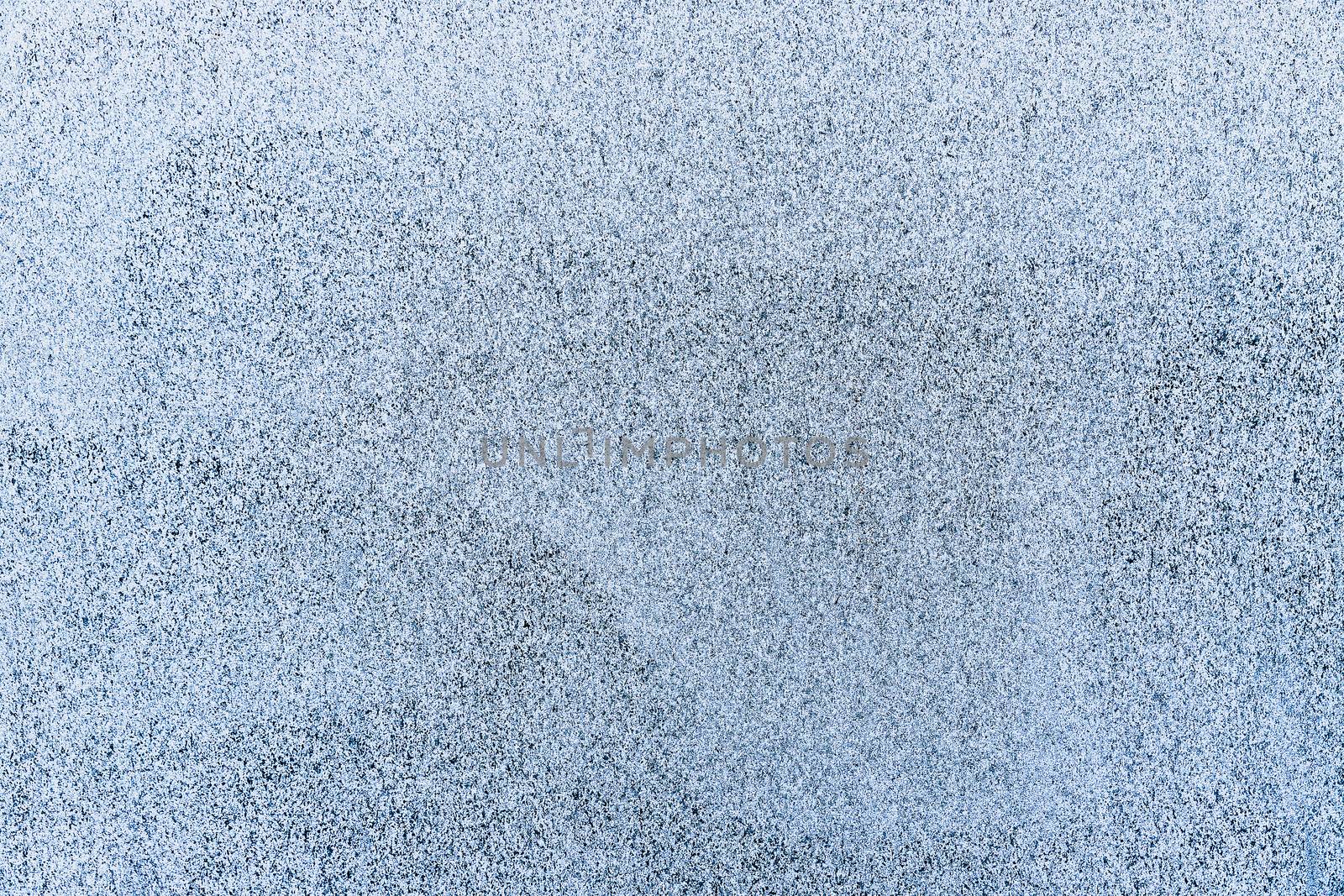 Textured blue stone background. Copy space.
