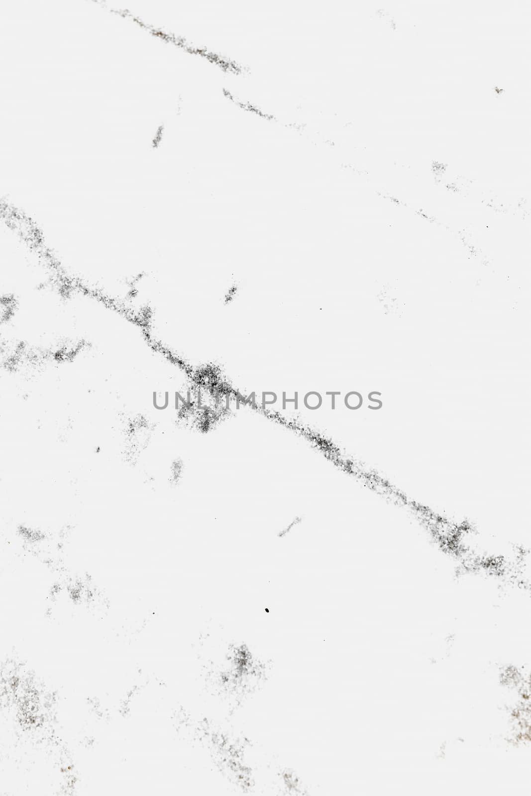 Textured white marble background. Copy space.