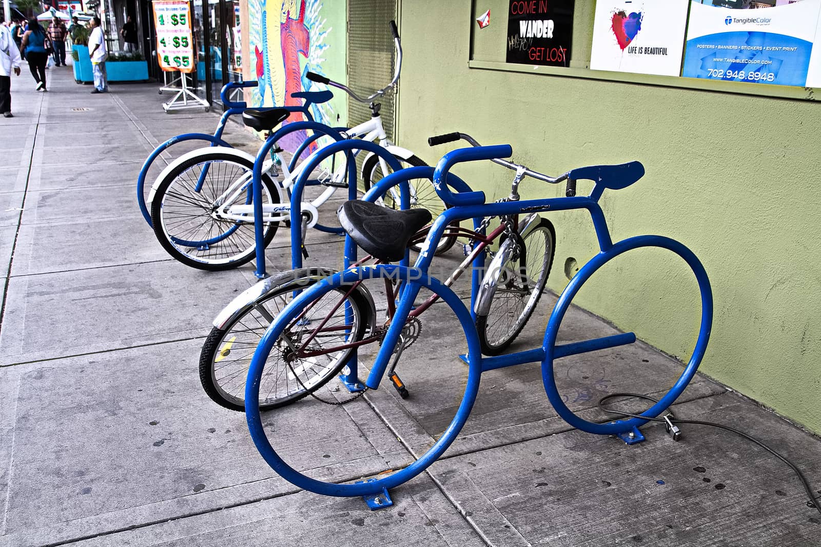 A bike parking opportunity with a symbol.bike parking Bicycle racks in bicycle parking facility Modern bike storage in the form of a steel spiral Bicycle parking.