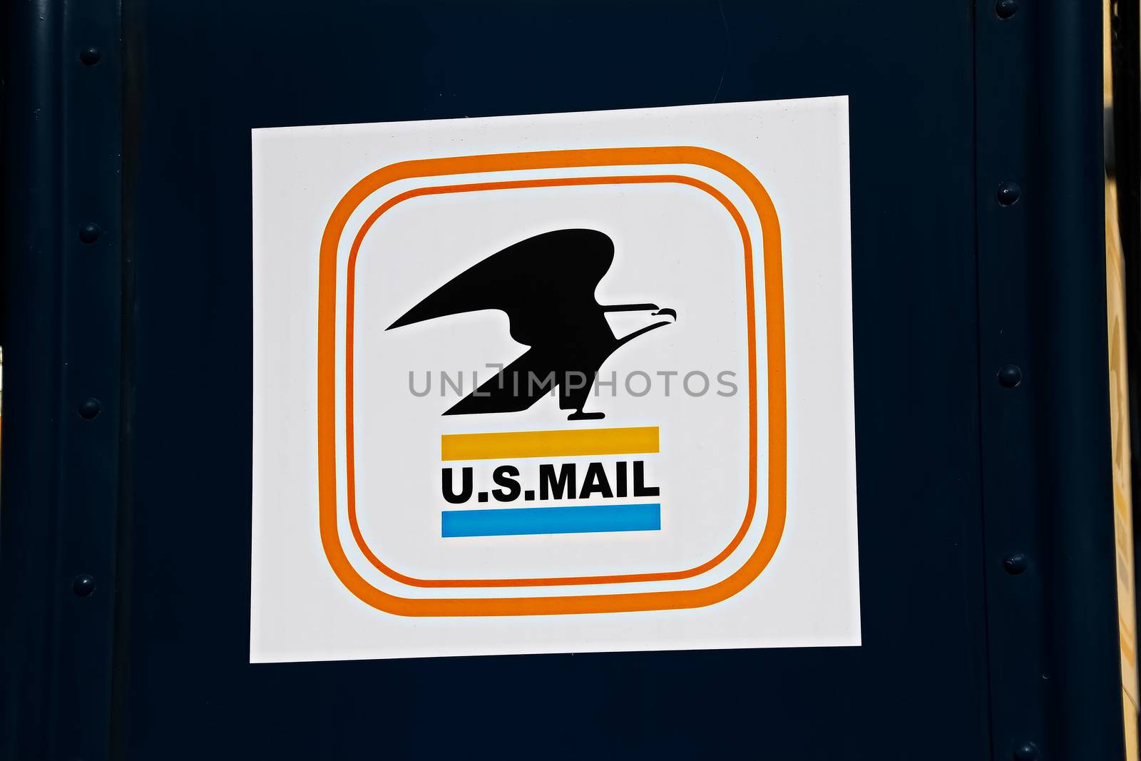Los Angeles,CA/USA - Nov 23,2019 : Close up of the United States Postal Service eagle logo on a neighborhood postal mailbox, as seen on election day. by USA-TARO