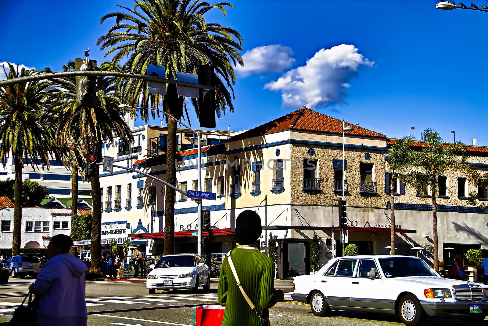 Santa Monica,CA/USA - Nov 23,2018 : People are waiting for the bus at the bus stop. Representatives of different nationalities live in United State of America. by USA-TARO