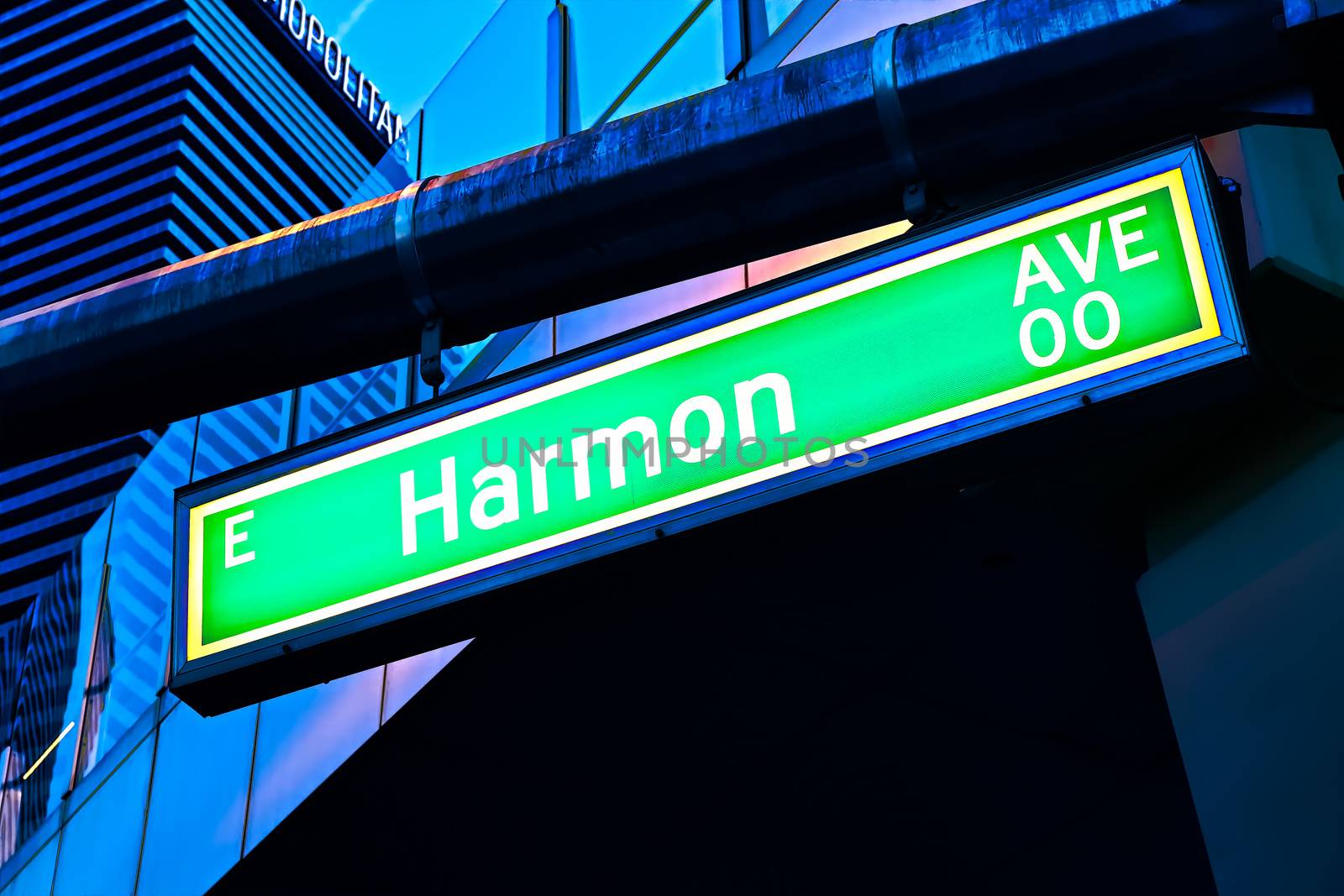 Road sign of Harmon Avenue.Street sign of Harmon Avenue.Green Harmon Avenue Sign with blue sky Background. by USA-TARO