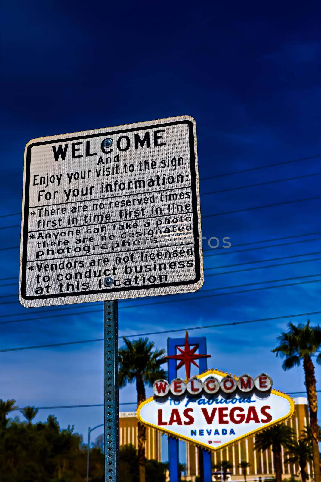 he Welcome to Fabulous Las Vegas sign on bright sunny day in Las Vegas.Welcome to Never Sleep city Las Vegas, Nevada Sign with the heart of Las Vegas scene in the background. by USA-TARO