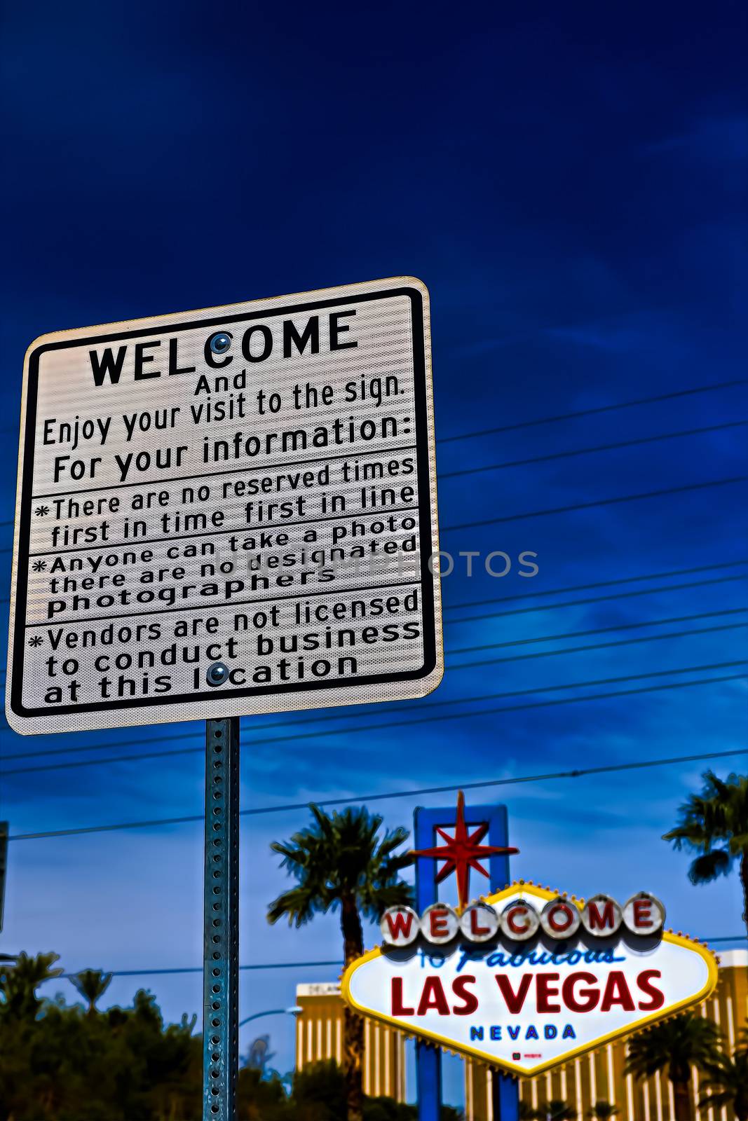 he Welcome to Fabulous Las Vegas sign on bright sunny day in Las Vegas.Welcome to Never Sleep city Las Vegas, Nevada Sign with the heart of Las Vegas scene in the background. by USA-TARO