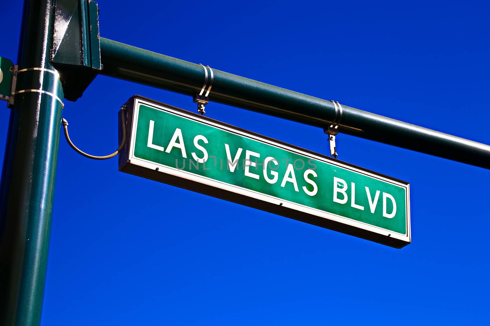 Road sign of Las Vegas BLVD.Street sign of Las Vegas Boulevard.Green Las Vegas Sign with blue sky Background. by USA-TARO