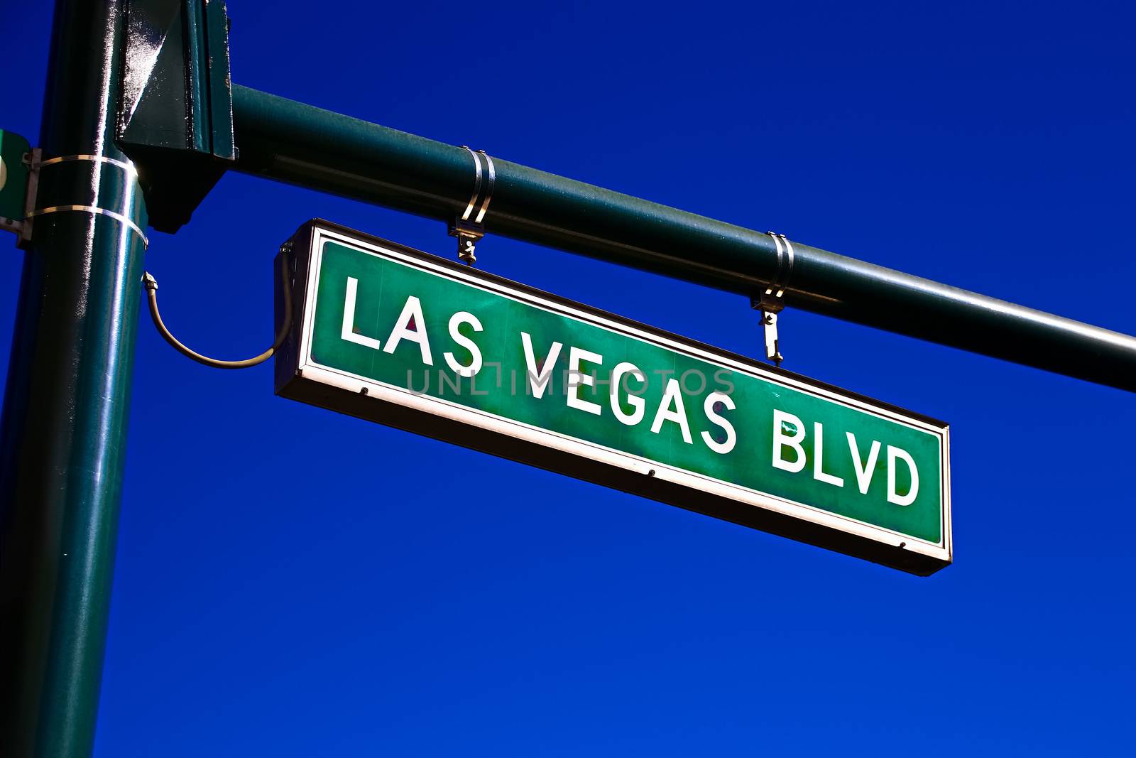 Road sign of Las Vegas BLVD.Street sign of Las Vegas Boulevard.Green Las Vegas Sign with blue sky Background. by USA-TARO