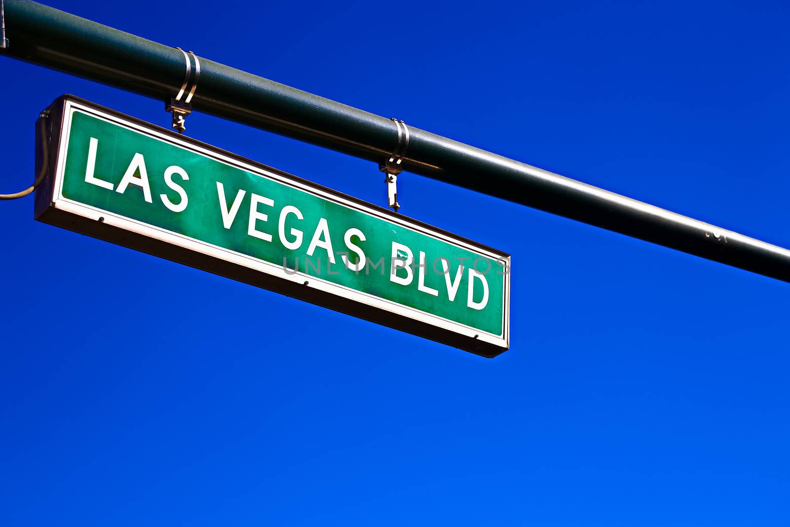 Road sign of Las Vegas BLVD.Street sign of Las Vegas Boulevard.Green Las Vegas Sign with blue sky Background.