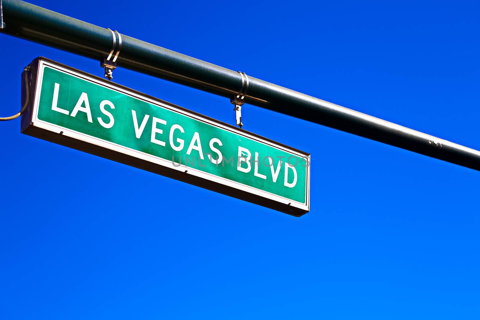 Road sign of Las Vegas BLVD.Street sign of Las Vegas Boulevard.Green Las Vegas Sign with blue sky Background. by USA-TARO