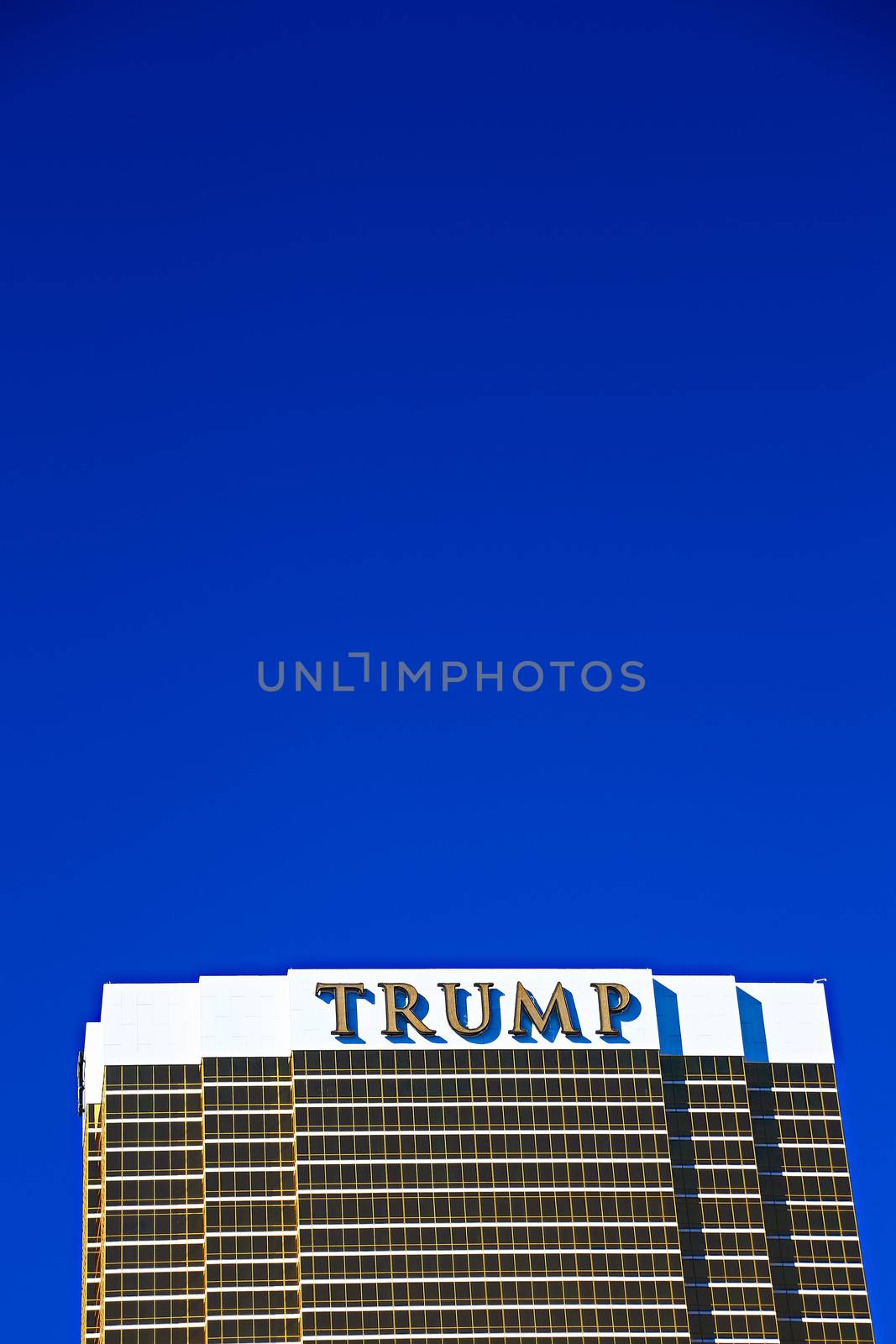 Las Vegas, USA - Sep 17, 2018: Trump International Hotel in Las Vegas, NV, named for real estate developer and politician Donald Trump. The luxury property's windows are gilded with 24-carat gold. by USA-TARO