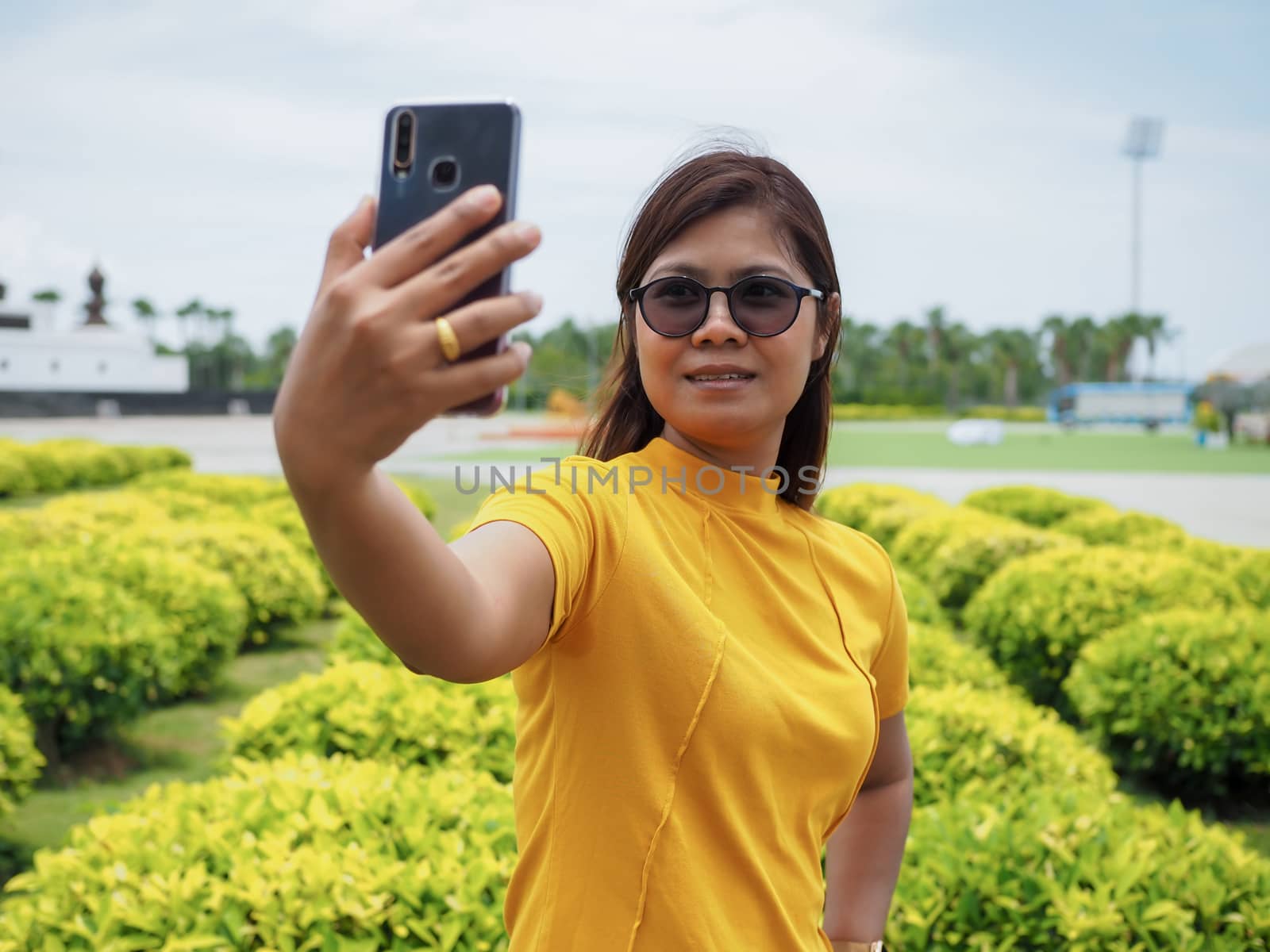 Woman taking a selfie while traveling