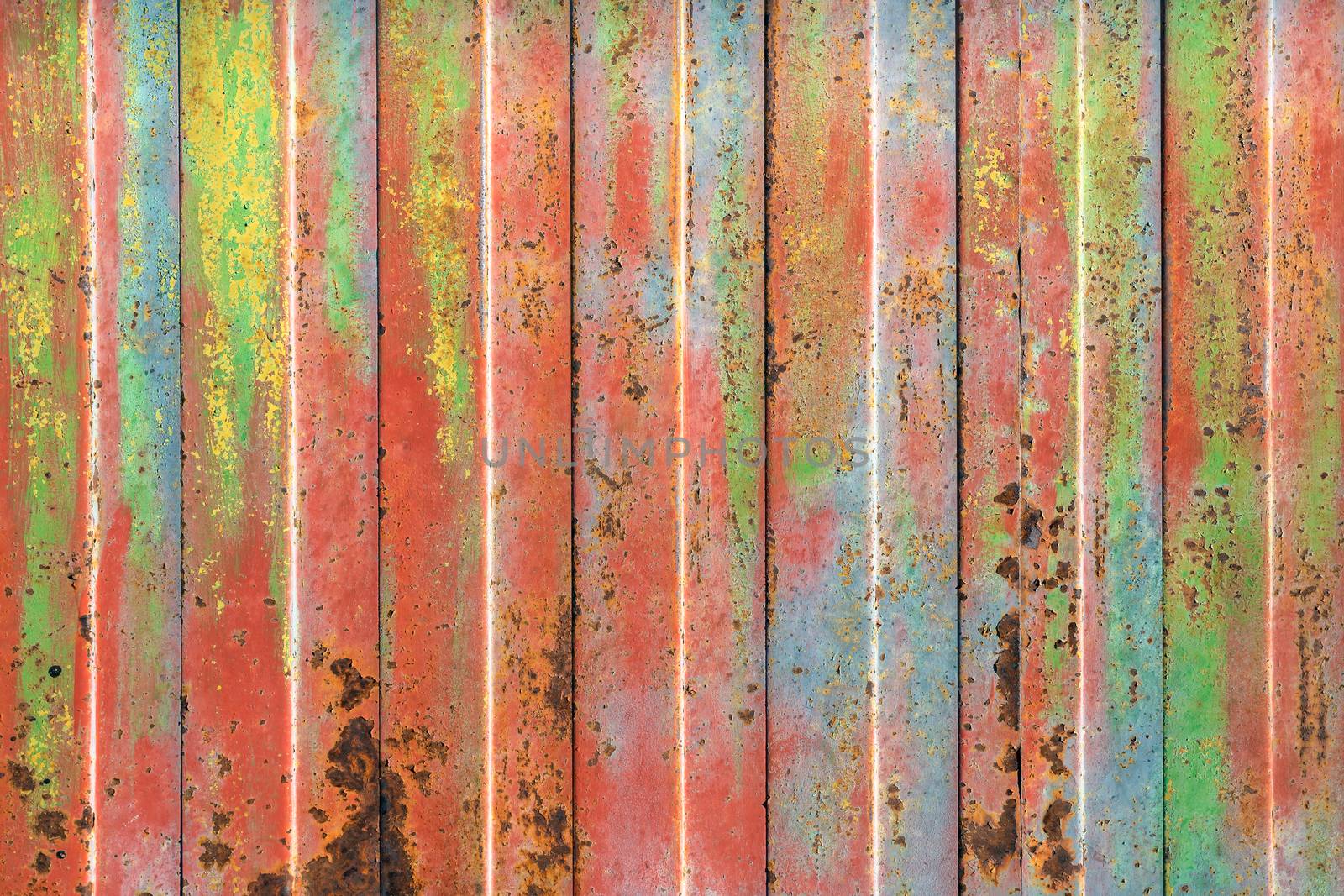 Rusty colorful rolling shutter by germanopoli