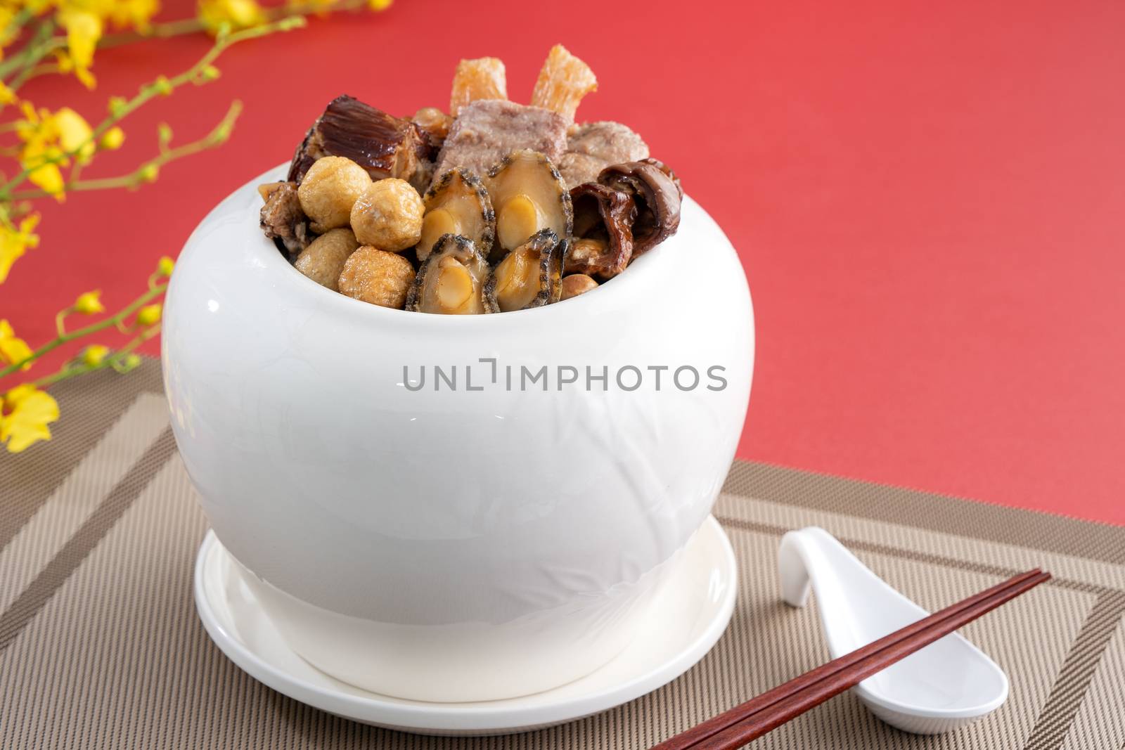 Traditional food of Chinese lunar new year, Buddha jumps over the wall, Chinese Soup Casserole dish, Buddha's Temptation, named Fo Tiao Qiang, close up.