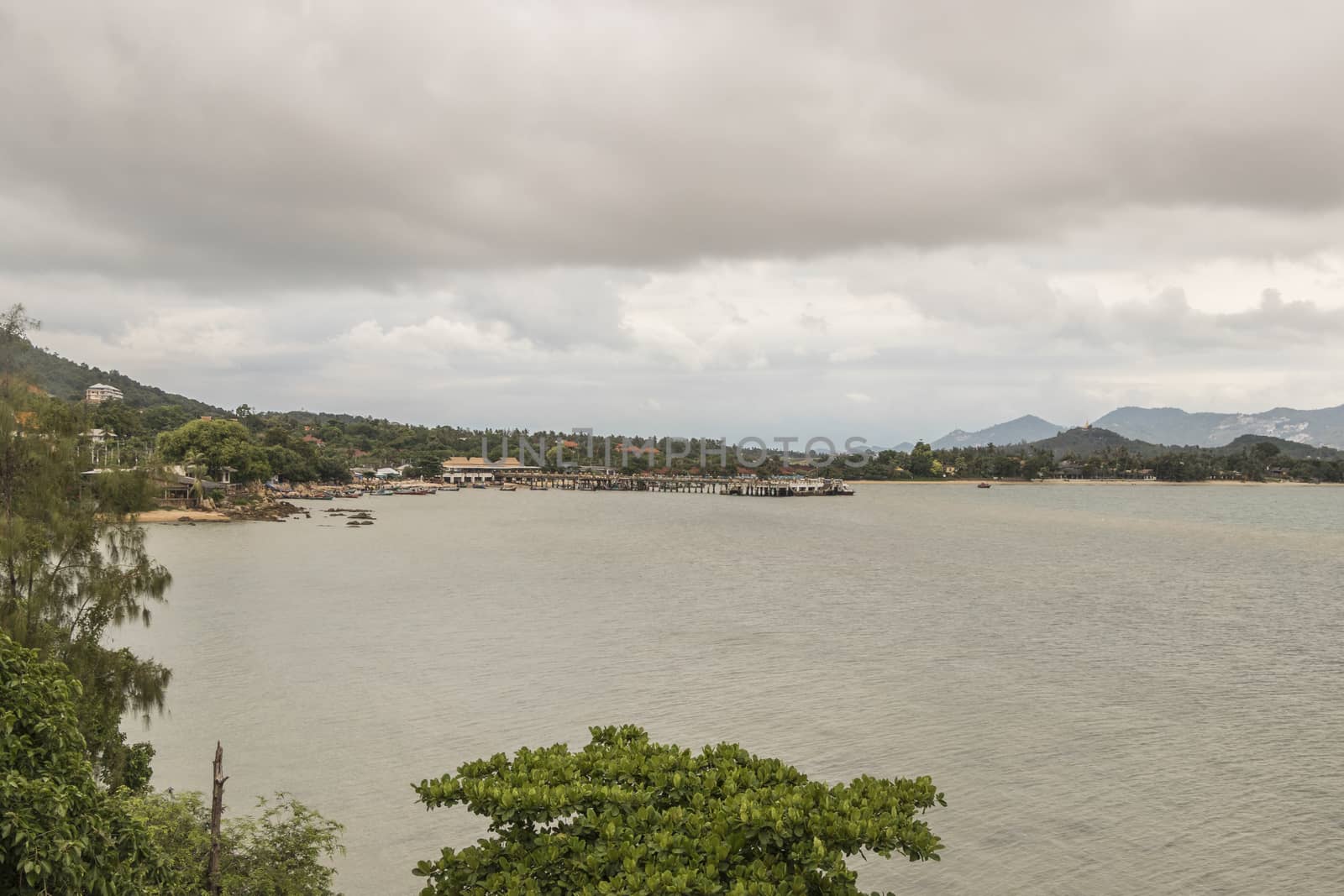 Koh Samui island in Surat Thani, Thailand. Turquoise water and gloomy storm clouds.