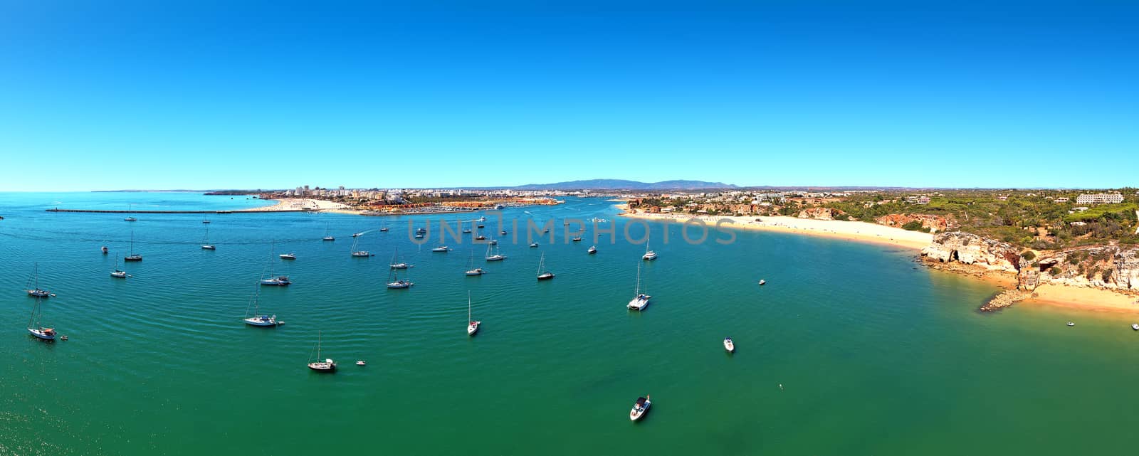 Aerial Panorama from the harbor from Portimao in the Algarve Por by devy