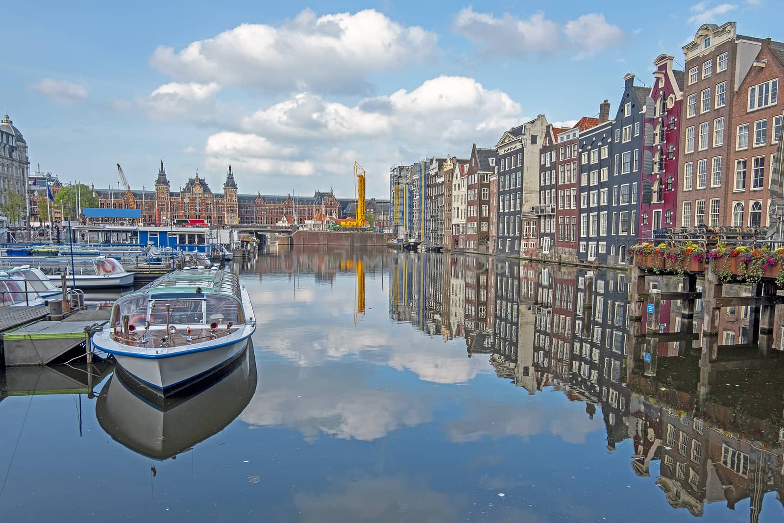 City scenic from Amsterdam with the Central Station in the Nethe by devy