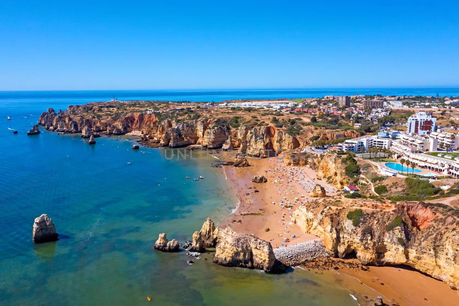 Aerial from Praia do Camillo on a rocky southcoast near Lagos in Portugal