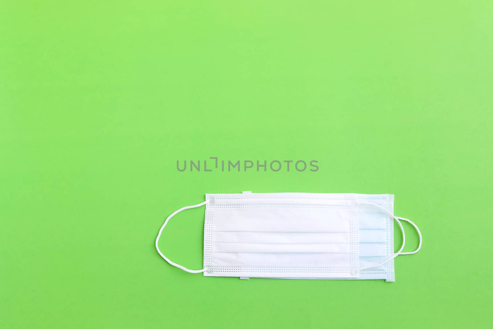 Protection mask filter on green background