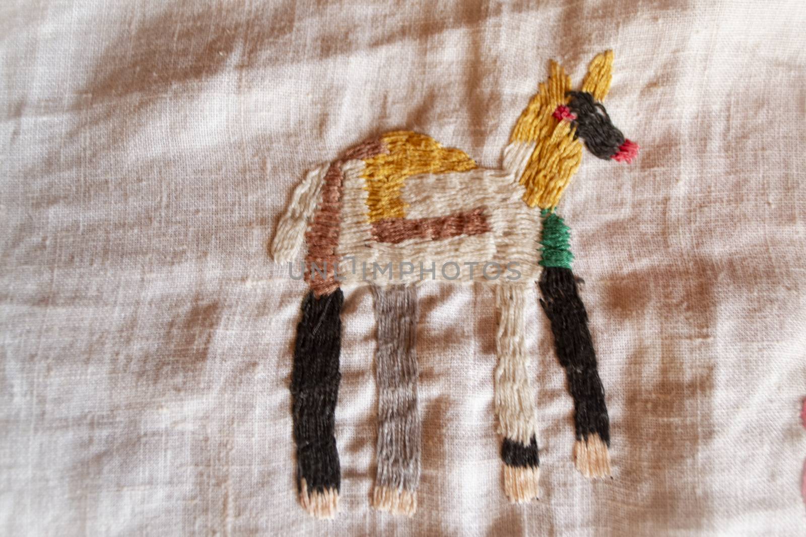 dog hand made embroidered smooth decoration on white fabric , vintage folk embroidery in Belarus, second half of 19 century
