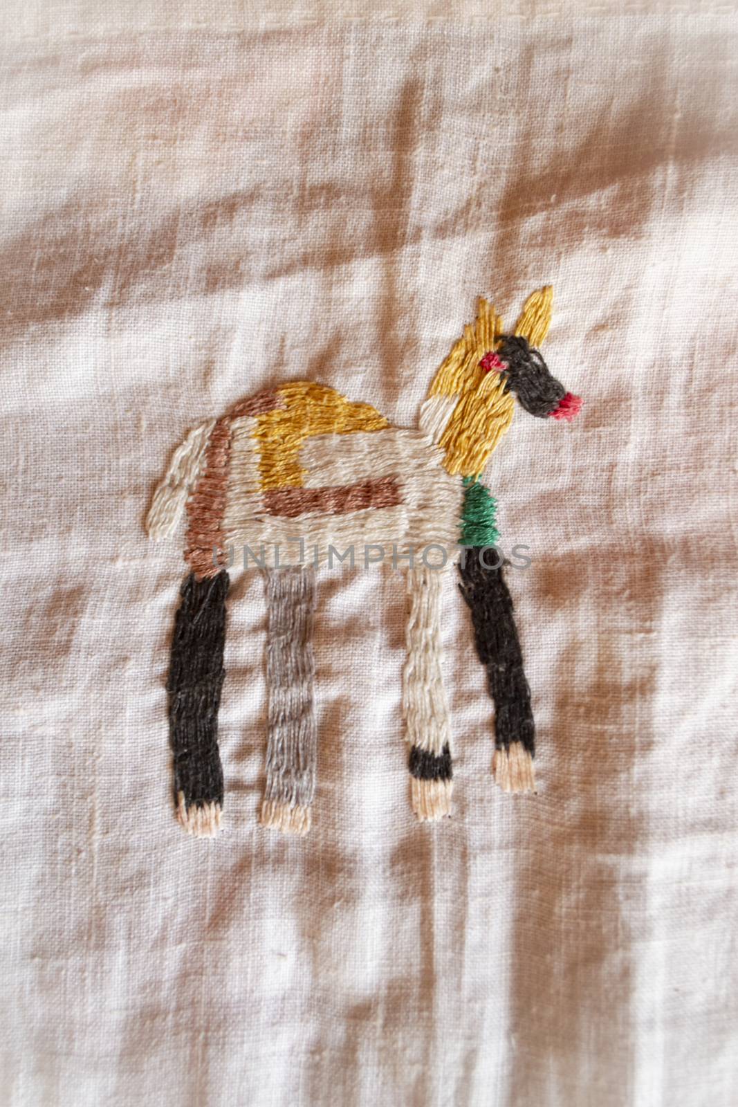 dog vertical hand made embroidered smooth decoration on white fabric , vintage folk embroidery in Belarus, second half of 19 century
