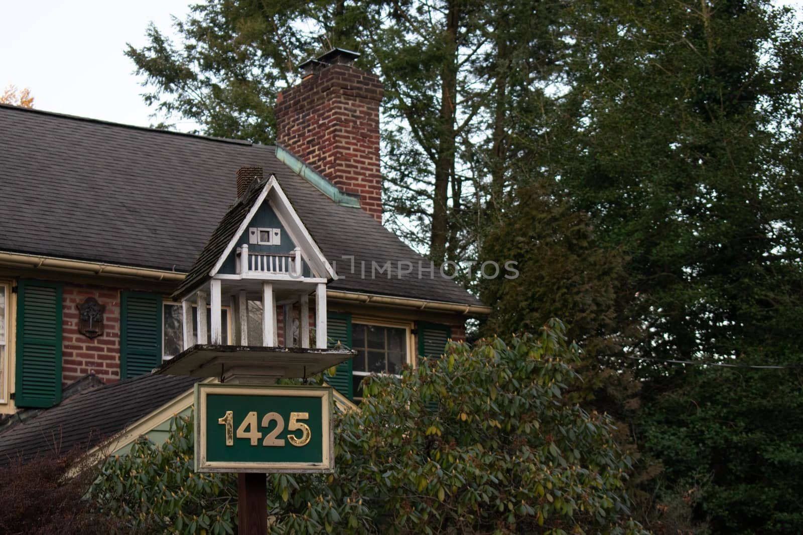 A Bird House That Looks Like a Real House by bju12290