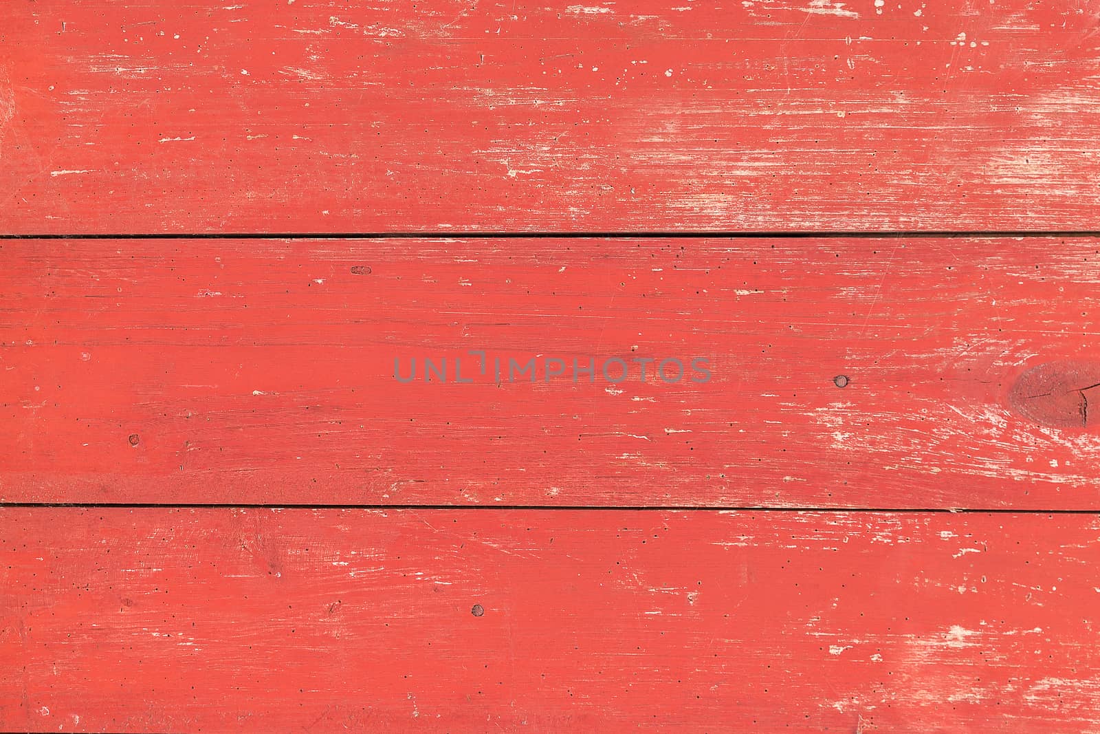 Worn red board wall background. Copy space.
