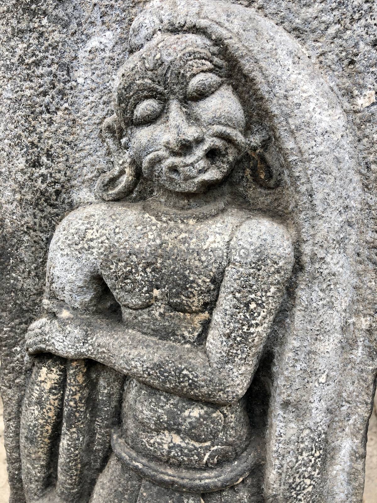 Bas relief sculpture of an aged man carved in the walls of Shiva temple at Tamil nadu by prabhakaran851