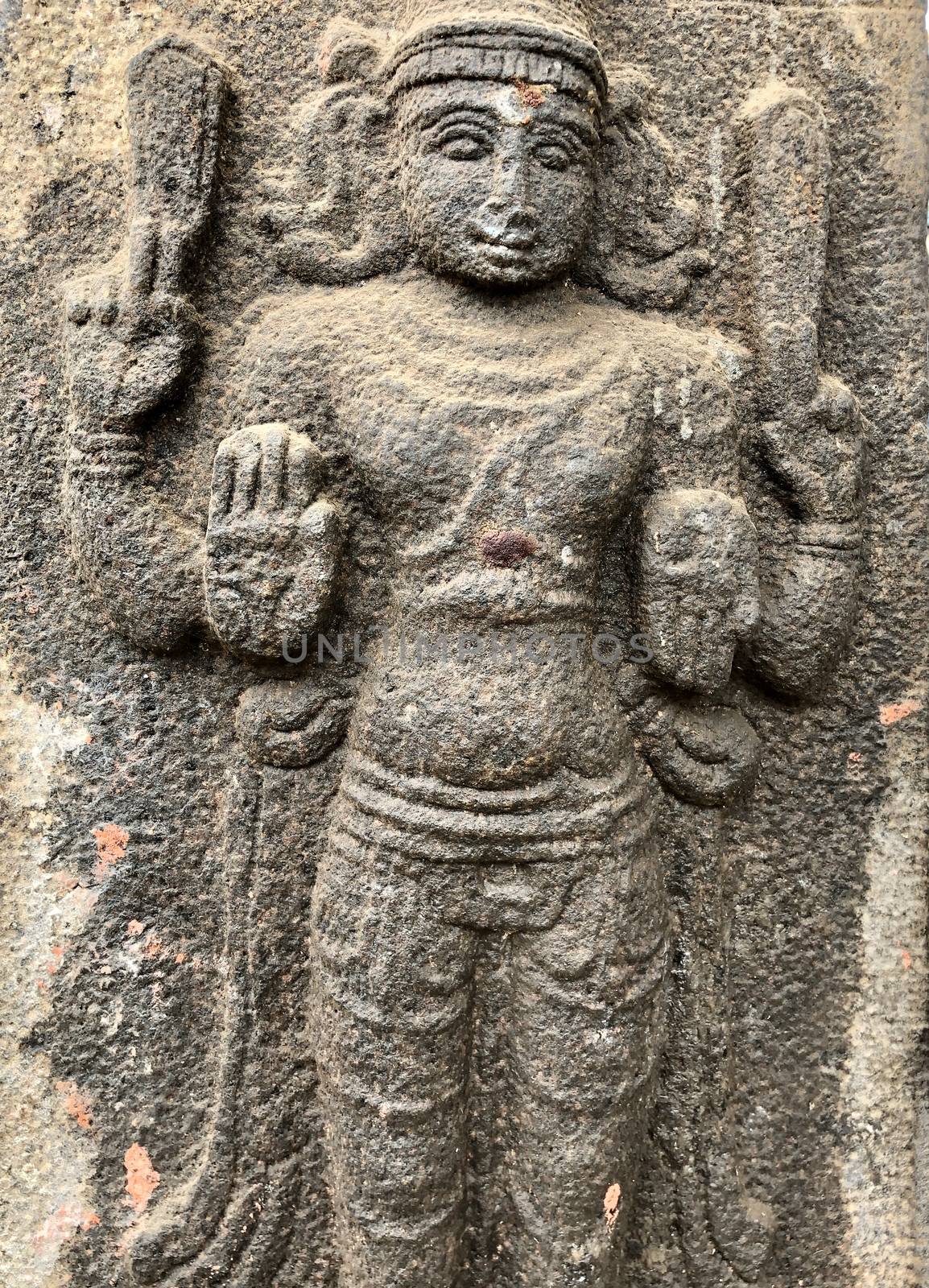 Bas relief sculpture of Hindu God carved in the stone walls at Shiva temple in Tamil nadu by prabhakaran851