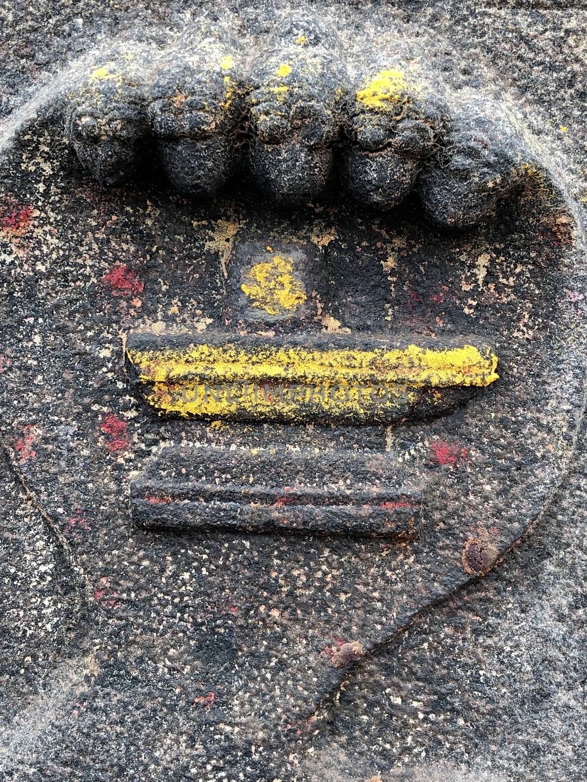 Ancient stone carvings of beautiful sculptures found in the temple in Tamilnadu. Beautiful bas-relief sculptures carved in the granite stone walls.