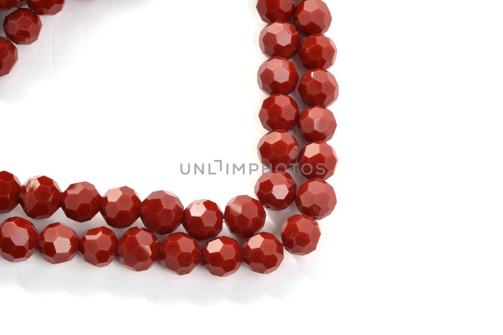 Beautiful brown Glass Sparkle Crystal Isoalted Beads on white background. Use for diy beaded jewelry. Space for text
