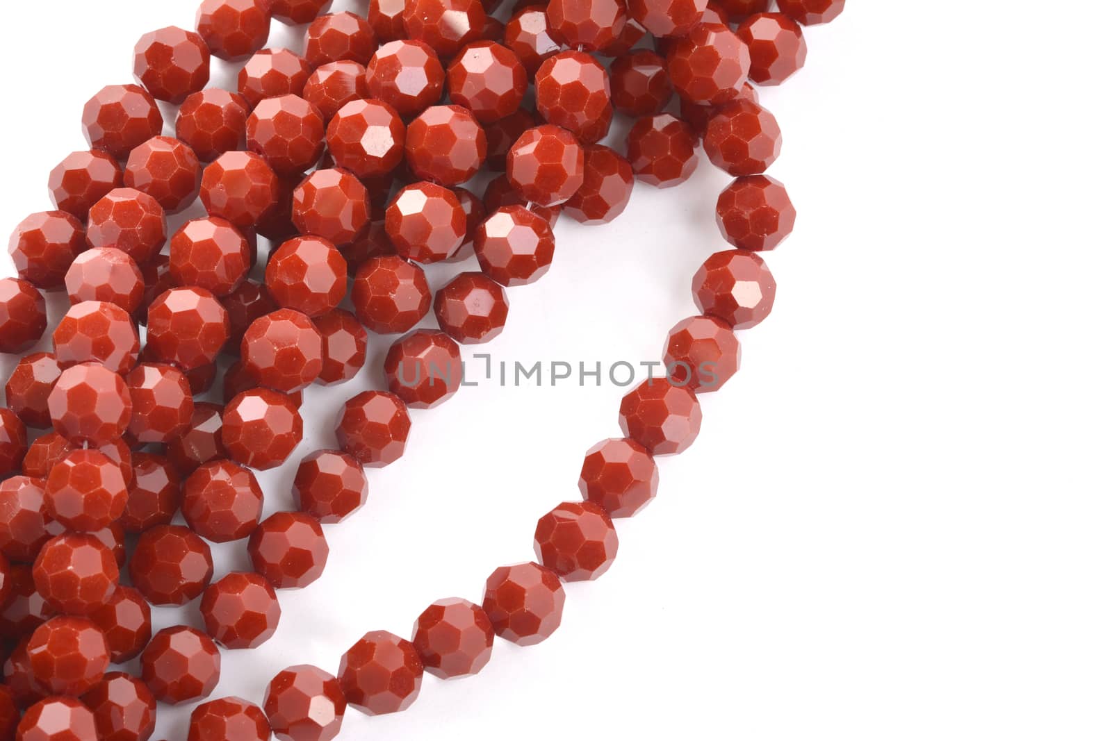 Beautiful brown Glass Sparkle Crystal Isoalted Beads on white background. Use for diy beaded jewelry. Space for text