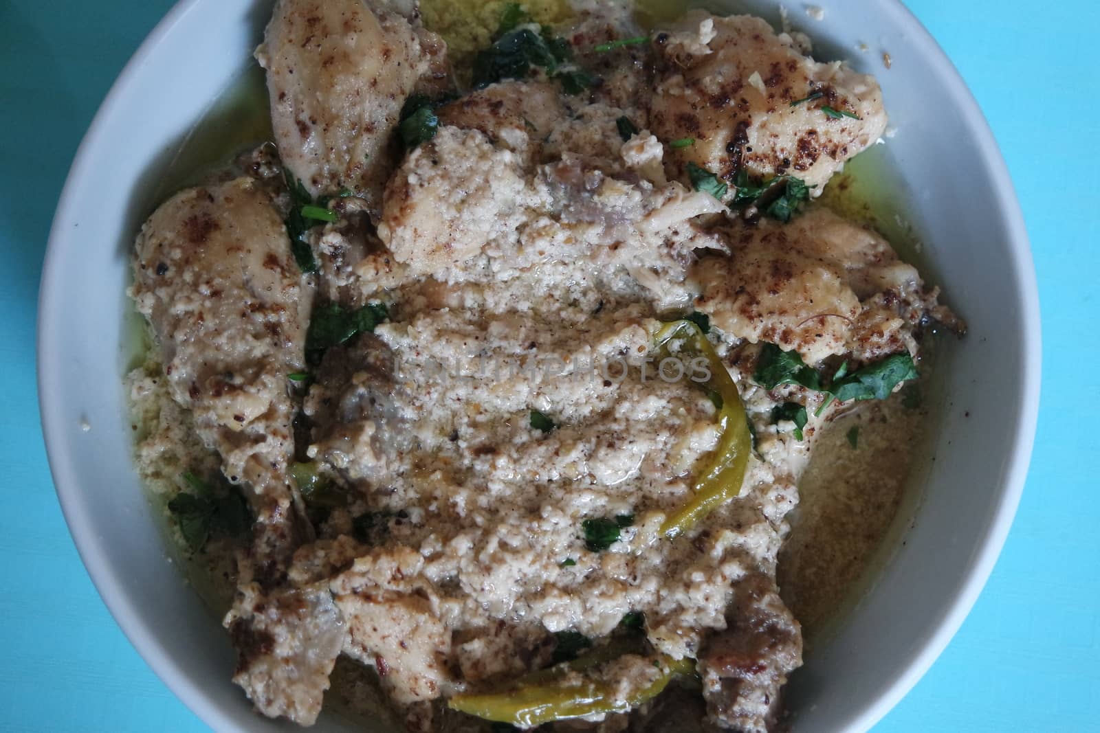Homemade chicken qorma or white qorma dish. Traditional dish for parties and ceremonial purpose popular in South Asian countries like Pakistan, India and Bangladesh