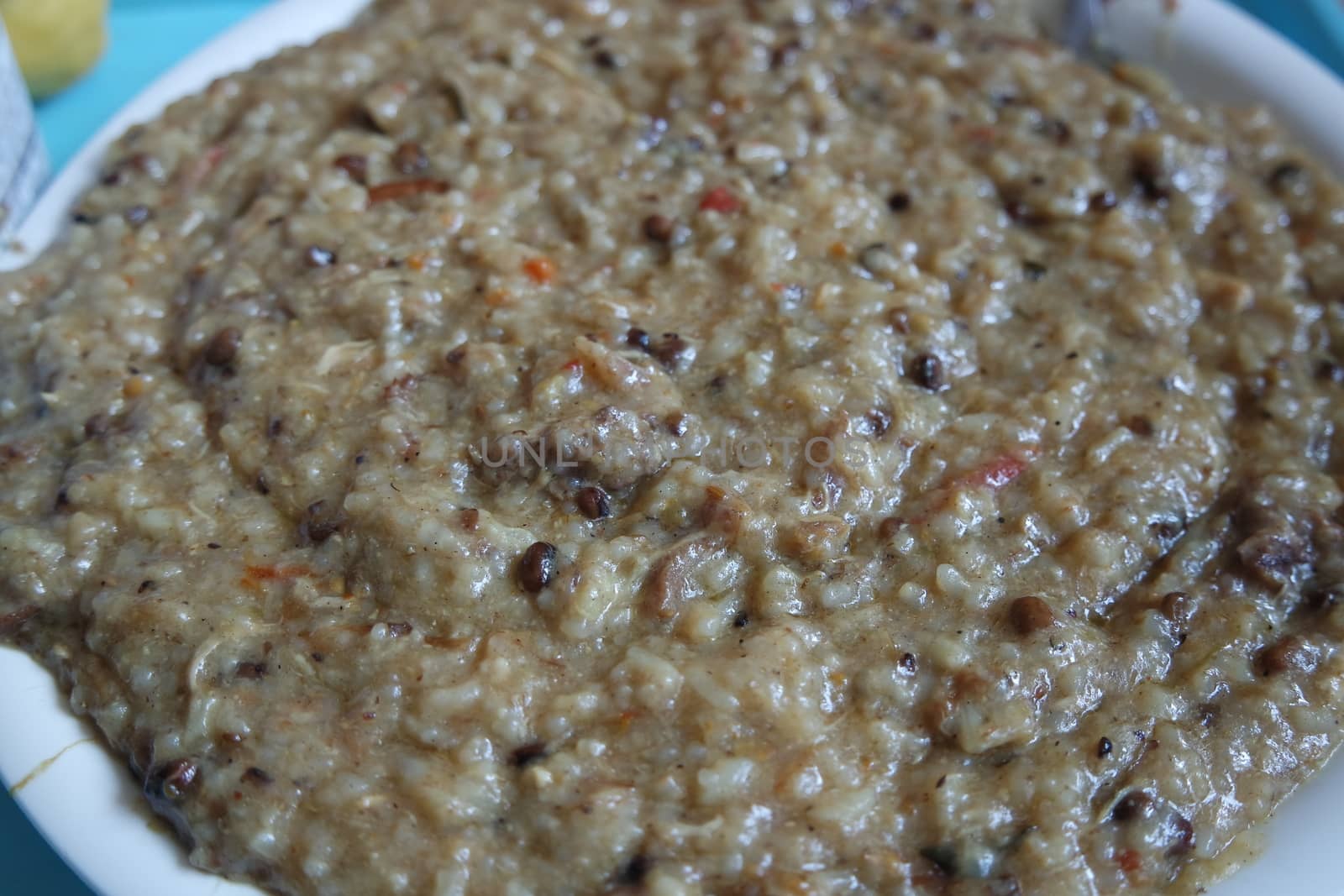 A close up view of Cooked white rice called Kichra served with green mint with traditional Charsadda recipe popular for its delicious taste in Pakistan