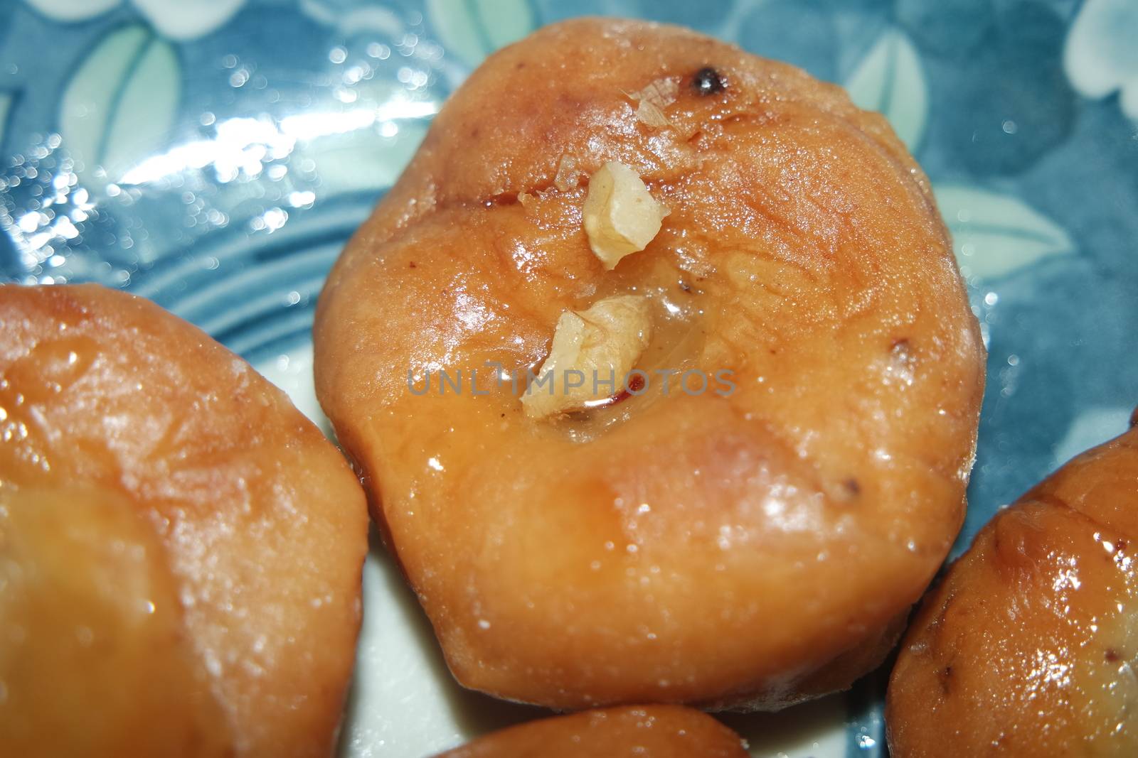 Closeup of delicious and tasty Asian sweet dish called balu shahi or baloshahi or balushahi. This dish is street sweet found in Pakistan India and Bangladesh and served in the festivities.