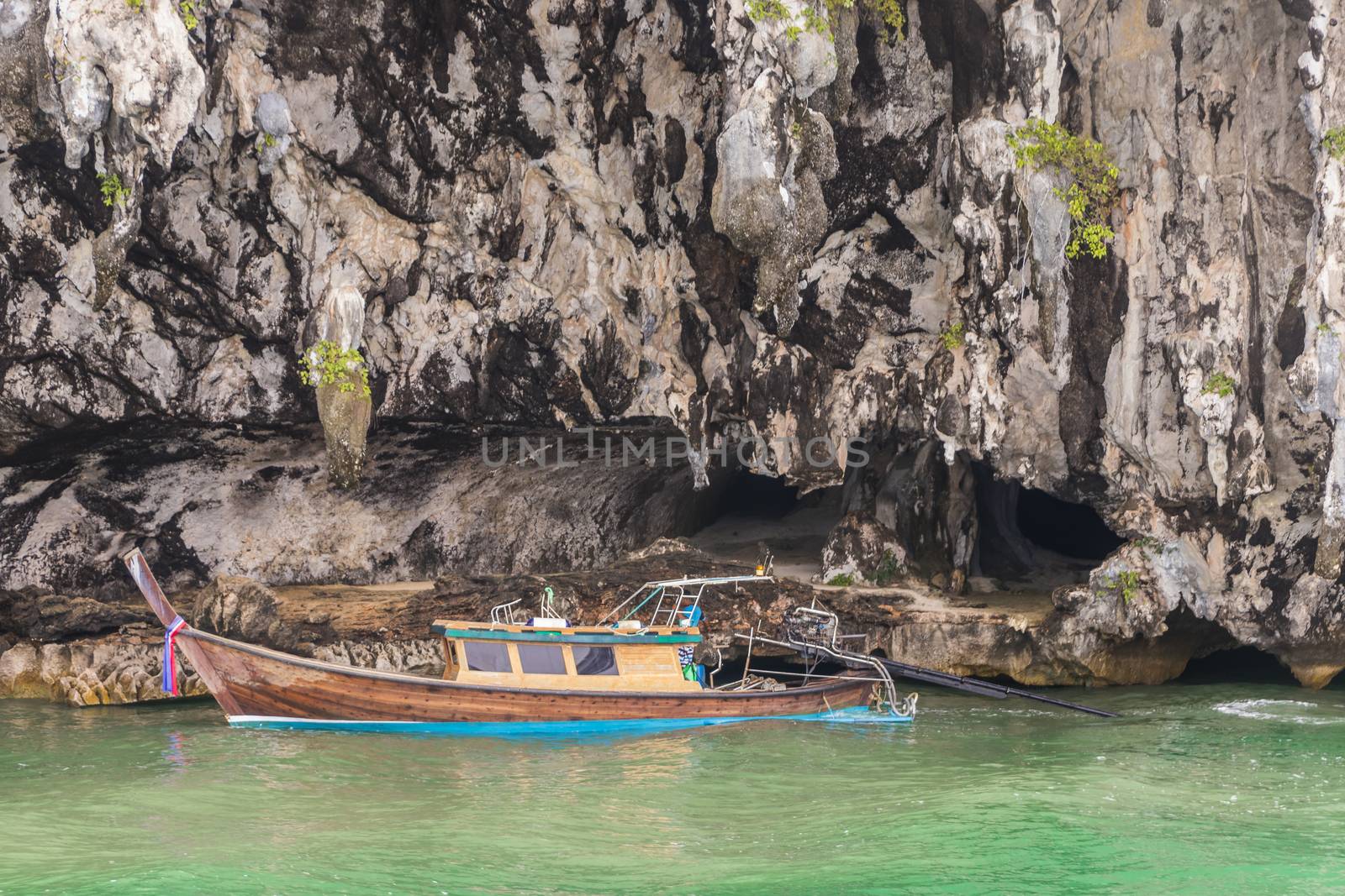 Bat Cave in Phang-Nga Bay, Thailand. Longtailboat Phang Nga. by Arkadij