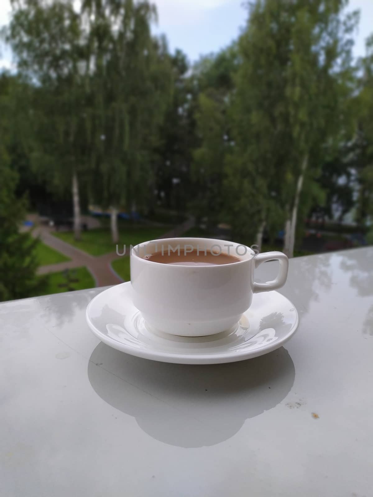 morning coffee on the windowsill of the balcony