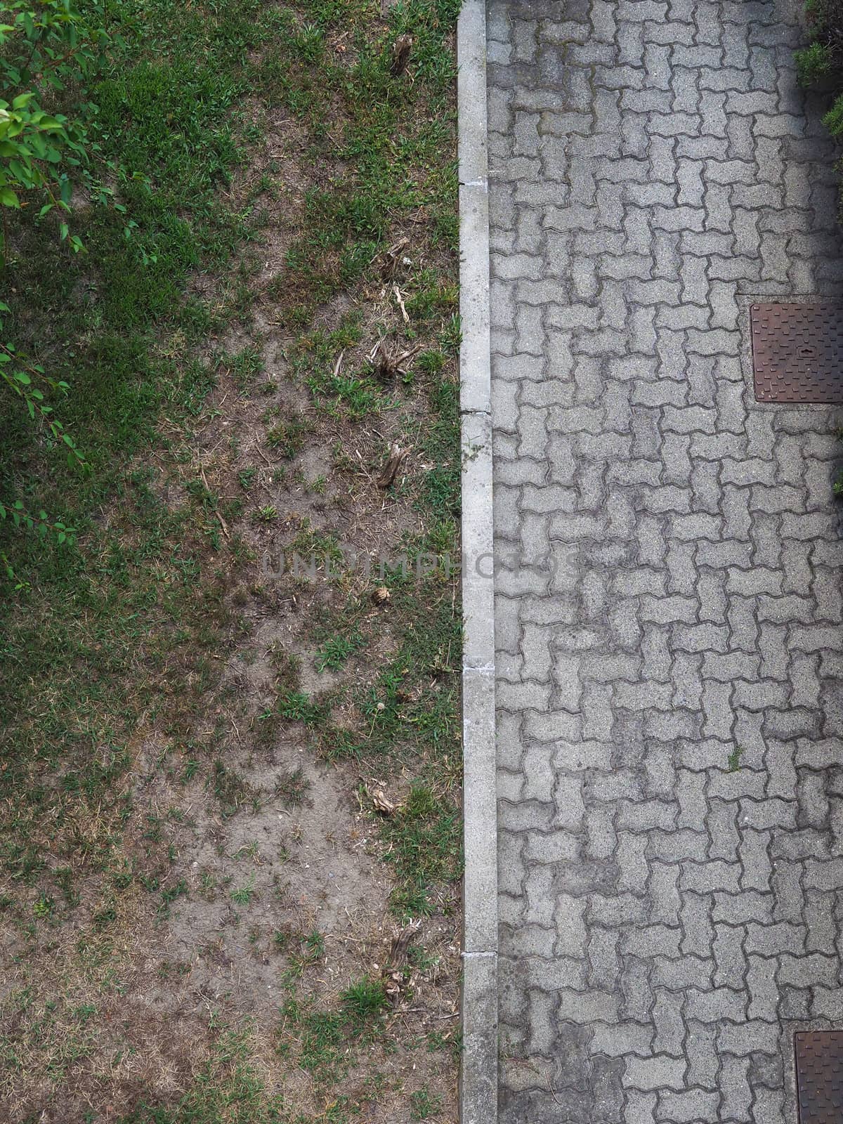 pavement by the grass by claudiodivizia
