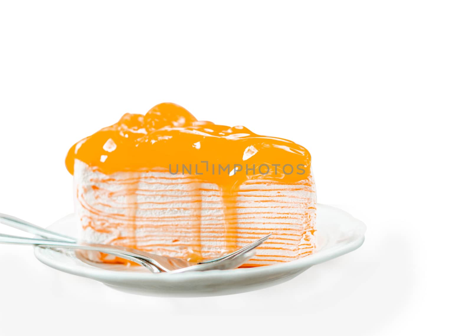 Closeup orange cake delicious on white background, selective foc by pt.pongsak@gmail.com