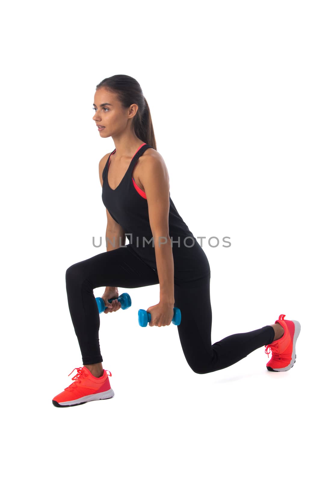 Healthy hispanic fitness girl with dumbbells working out isolated on white background