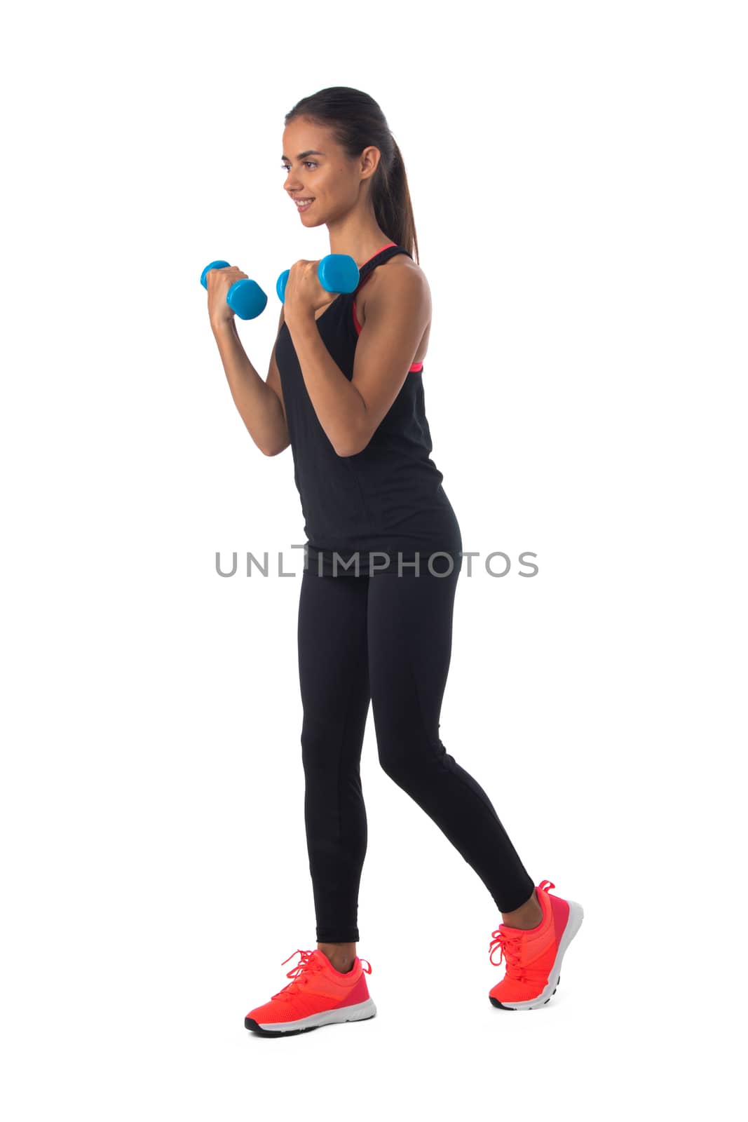 Healthy hispanic fitness girl with dumbbells working out isolated on white background