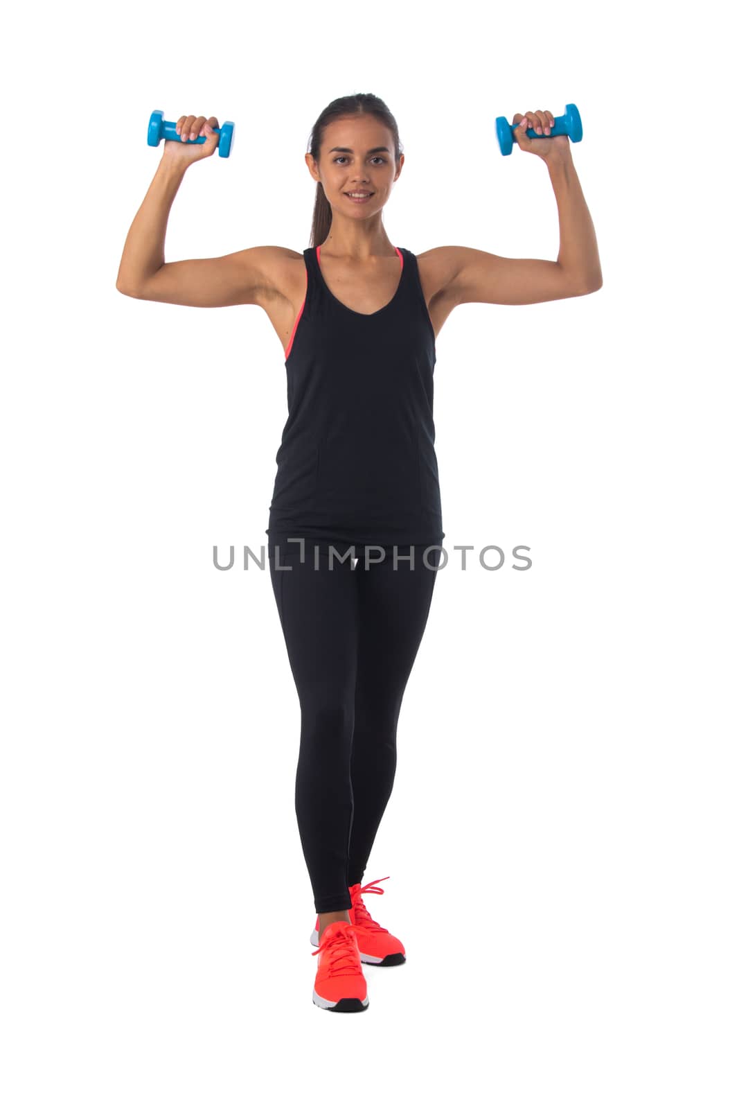 Healthy hispanic fitness girl with dumbbells working out isolated on white background