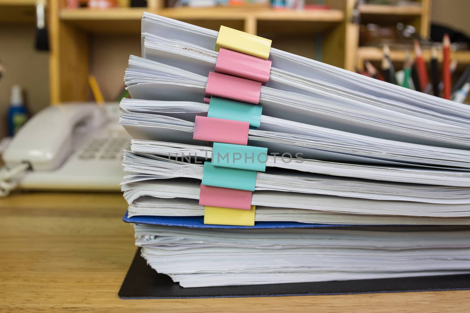 file folder and Stack of business report paper file on the table in a work office, concept document in work office