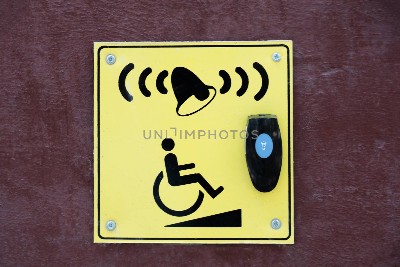 A pointer and a button to call for help for disabled people and people in wheelchairs.