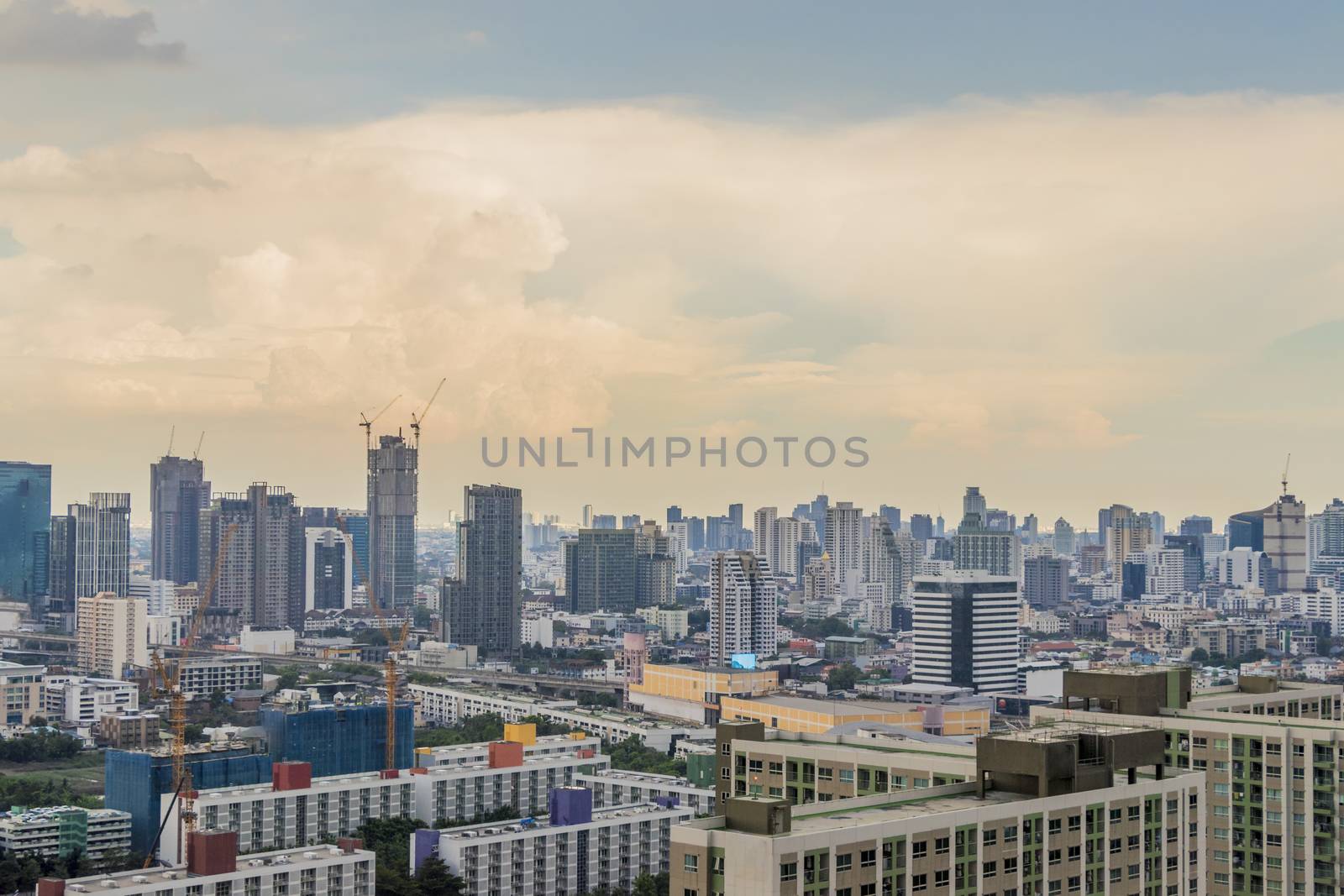 City panorama Bangkok, Thailand with incredible cloud formation. by Arkadij