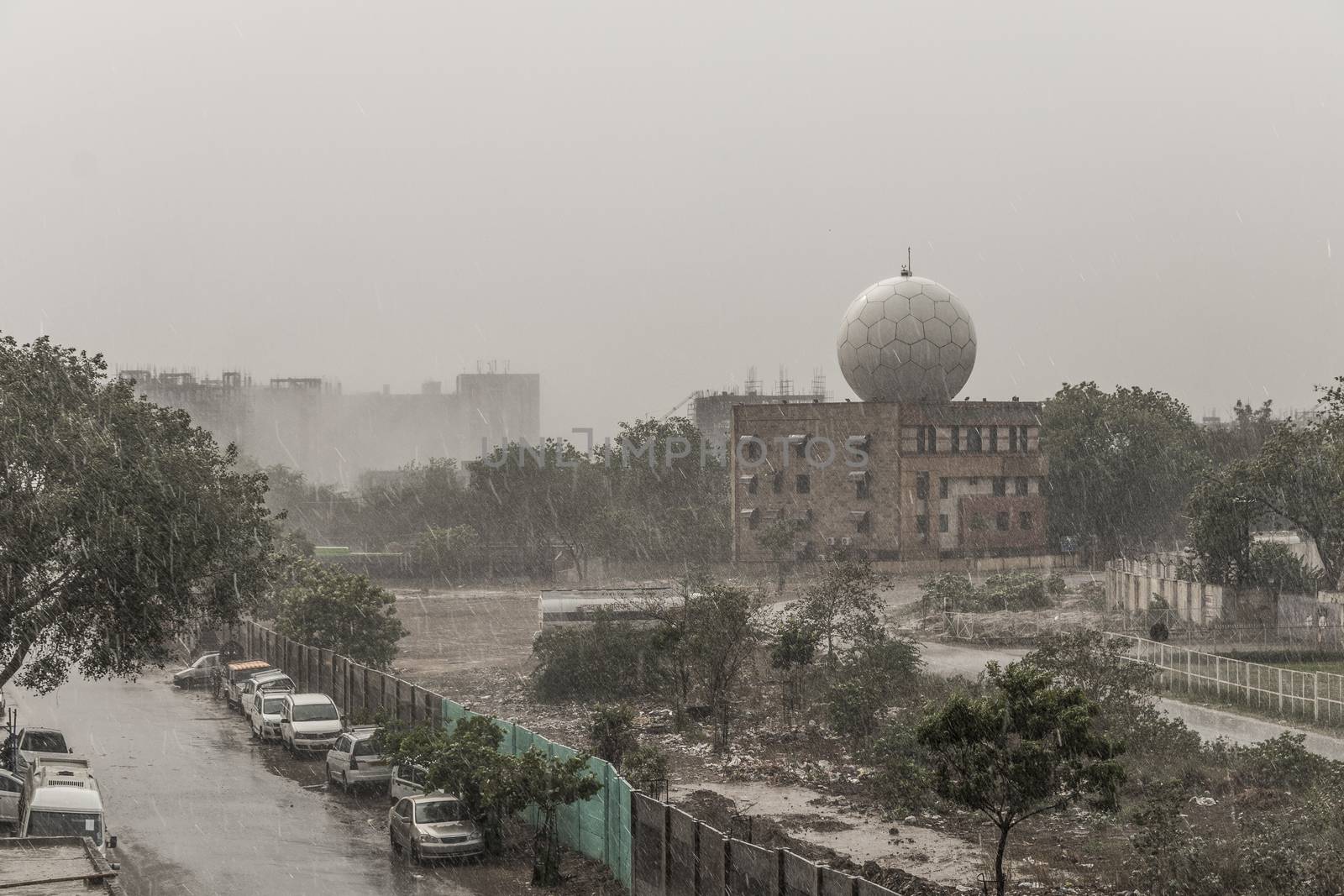 Monsoon rain in New Delhi India. Weather station at the Delhi airport.