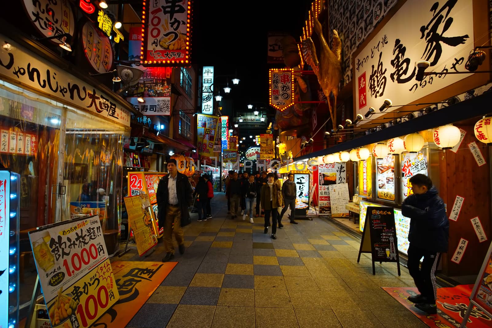 Osaka, Japan - December 15, 2019 : The famous Shinsekai shopping street in Osaka city, this is the travel destinations of Shinsekai district, Osaka city in Kansai area of Japan.