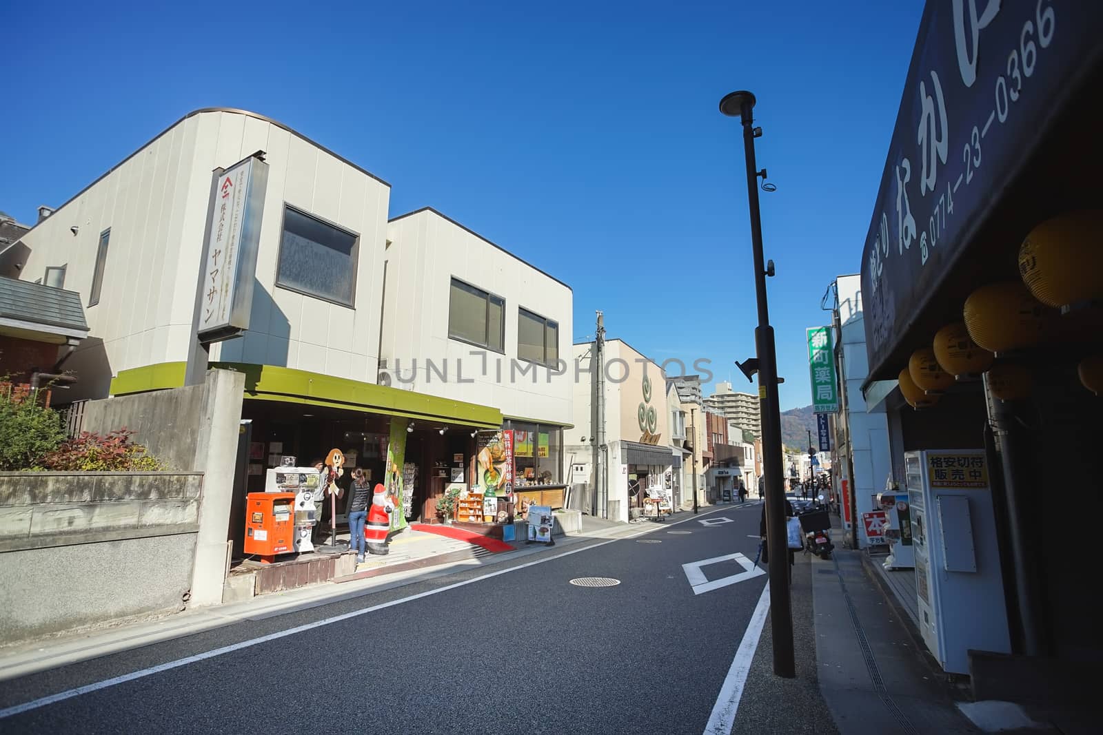 Uji, Japan - December 16, 2019 : Peaceful scene of downtown close to Uji JR Station in Uji city, Kyoto, Japan.
