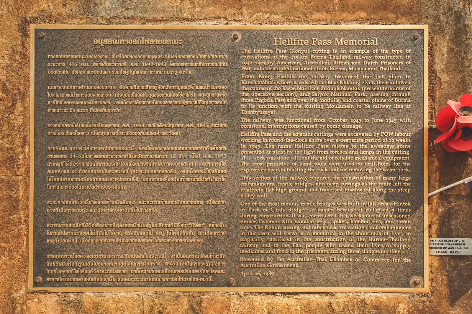 Kanchanaburi, Thailand - January 17, 2020 : Metal plate Of Thai and Englsh for Hellfire pass Memorial in Kanchanaburi province, Thailand. This is the memorial dedicated to Prisoners of War (WWII).