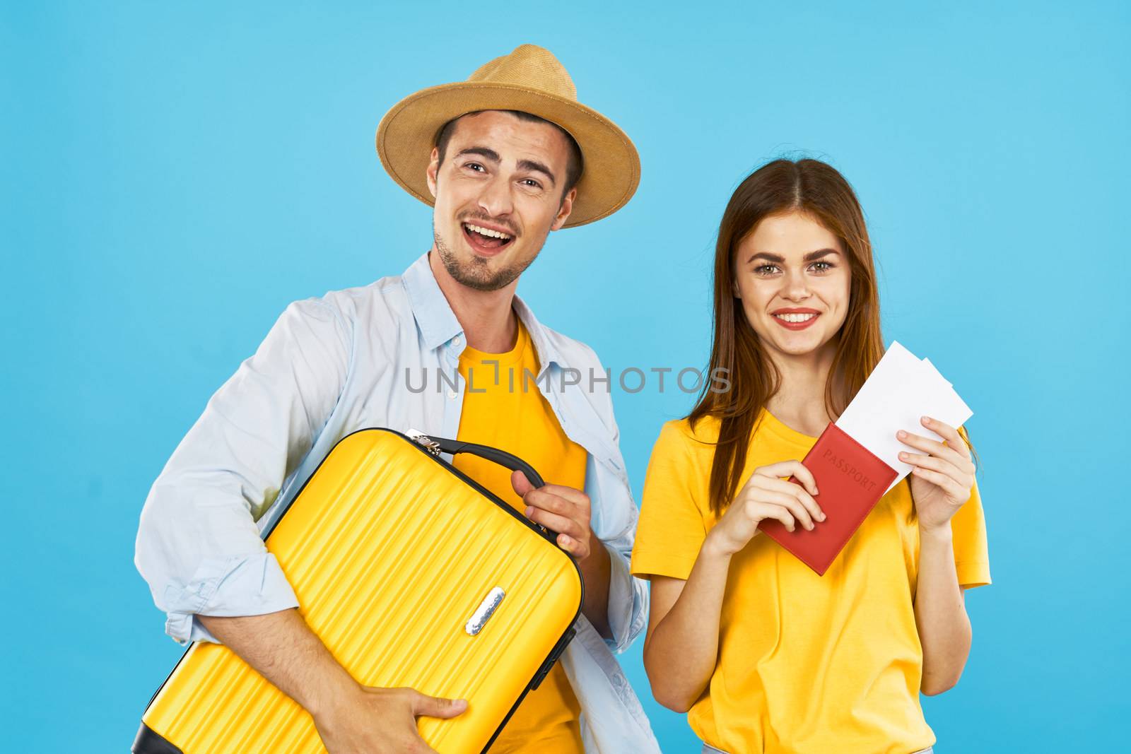 Man and woman tourists passport and plane ticket luggage passenger airport family fun